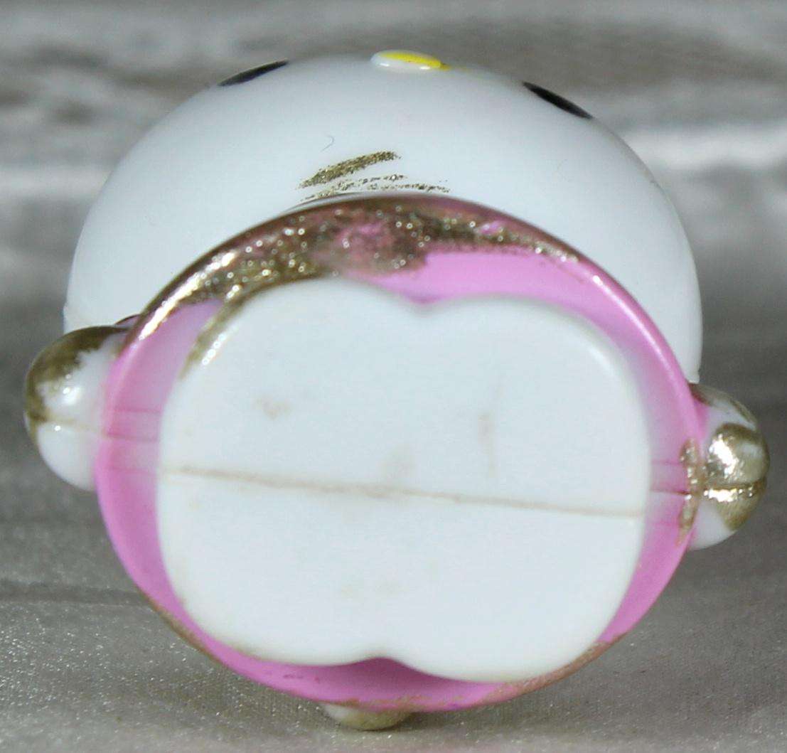 Miniature bunny with pink dress
