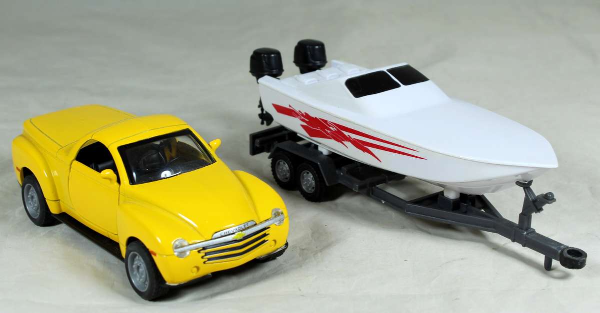 New Ray - 2003 Chevy SSR plus speed boat