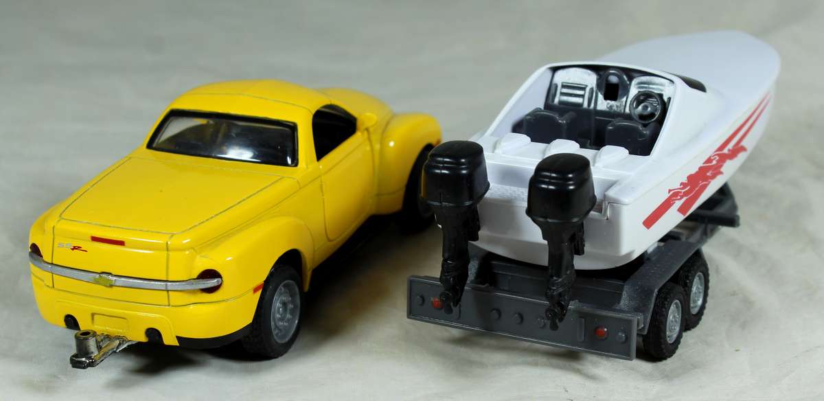 New Ray - 2003 Chevy SSR plus speed boat