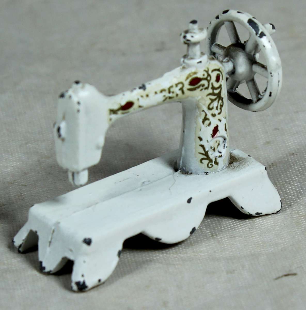 Miniature metal sewing machine