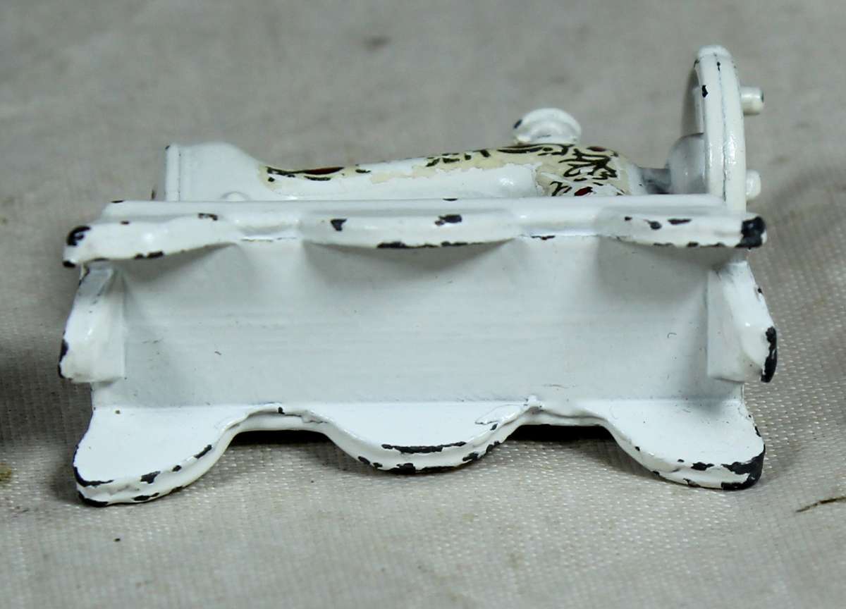 Miniature metal sewing machine