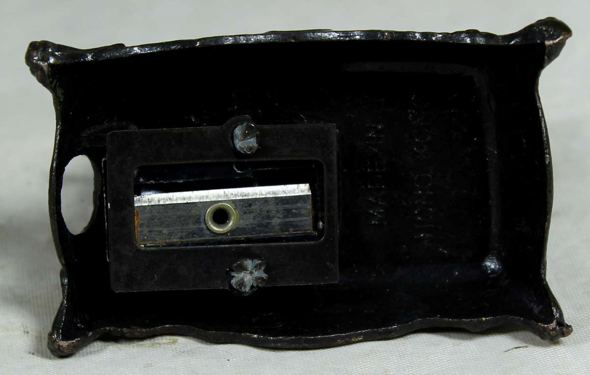 Miniature metal sewing machine pencil sharpener