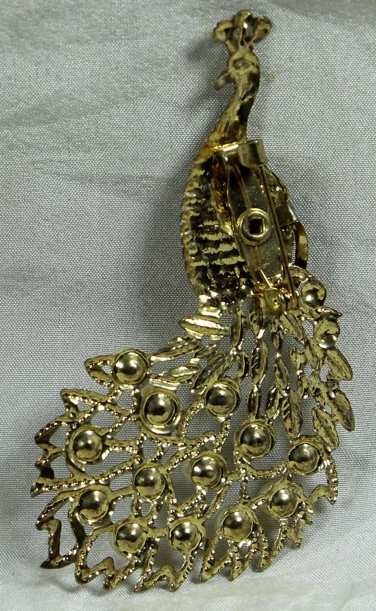 Peacock with pearls broach