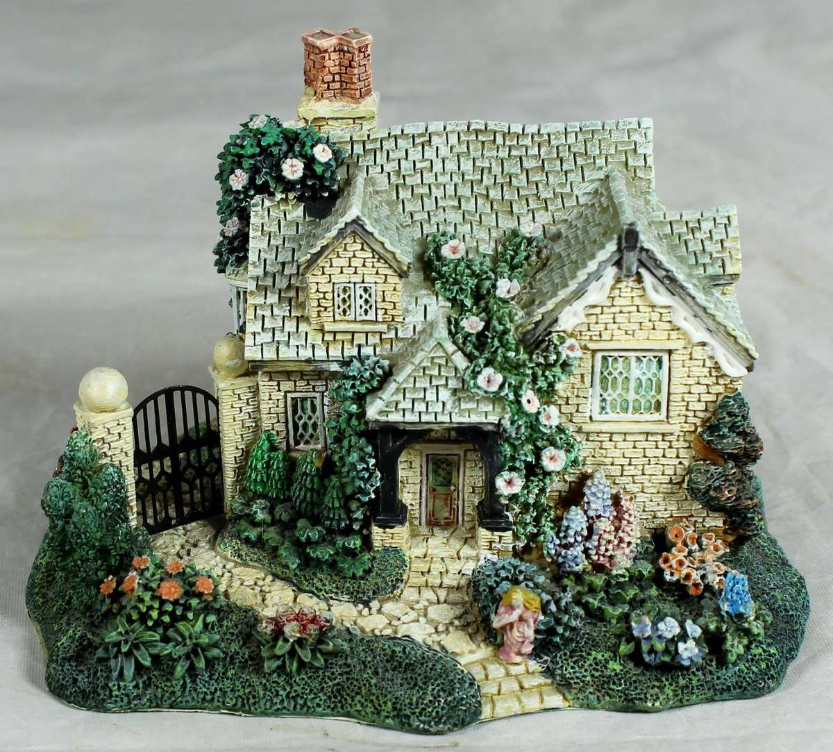 Country house with garden & black gate