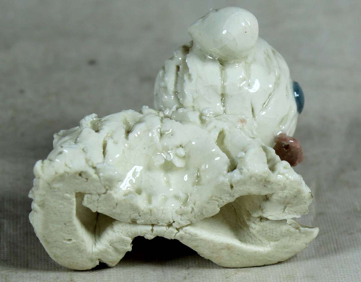 Miniature molded scruffy dog