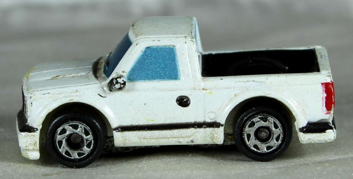 Micro car - white pickup