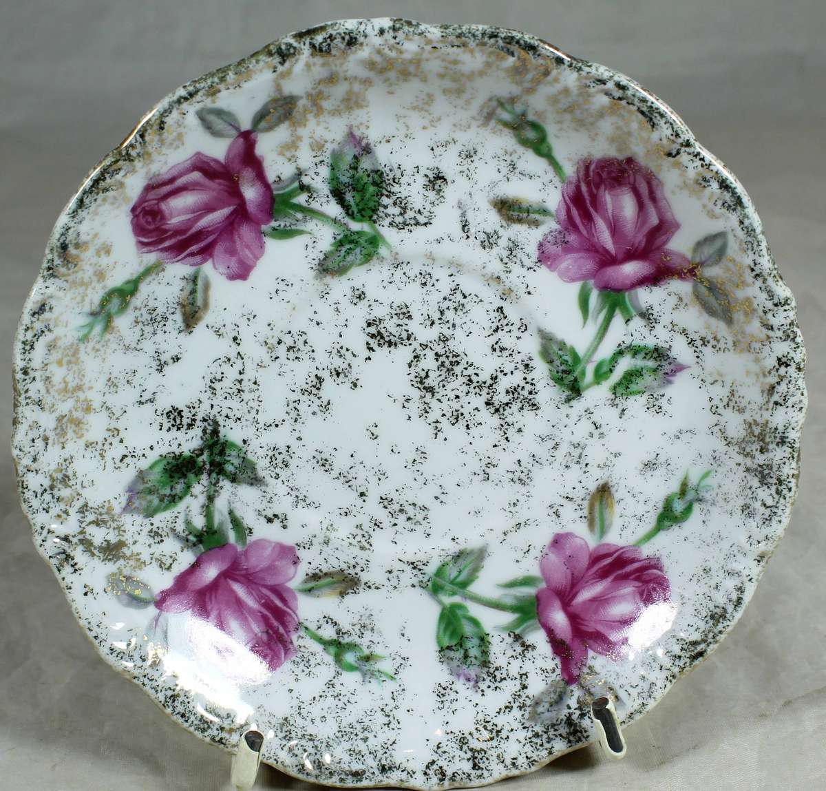 Saucer with purple roses