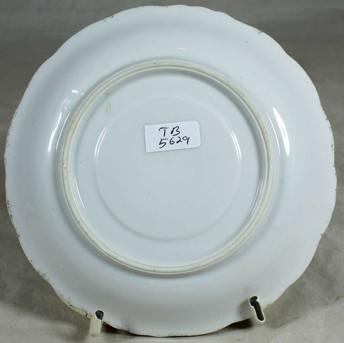 Saucer with purple roses