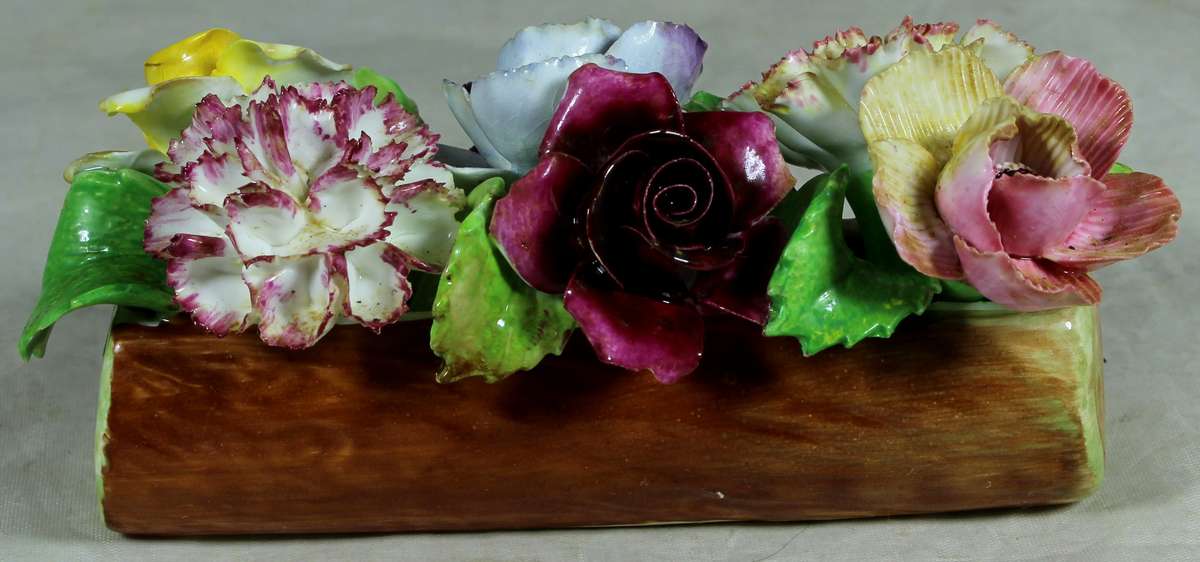 Posies in a log