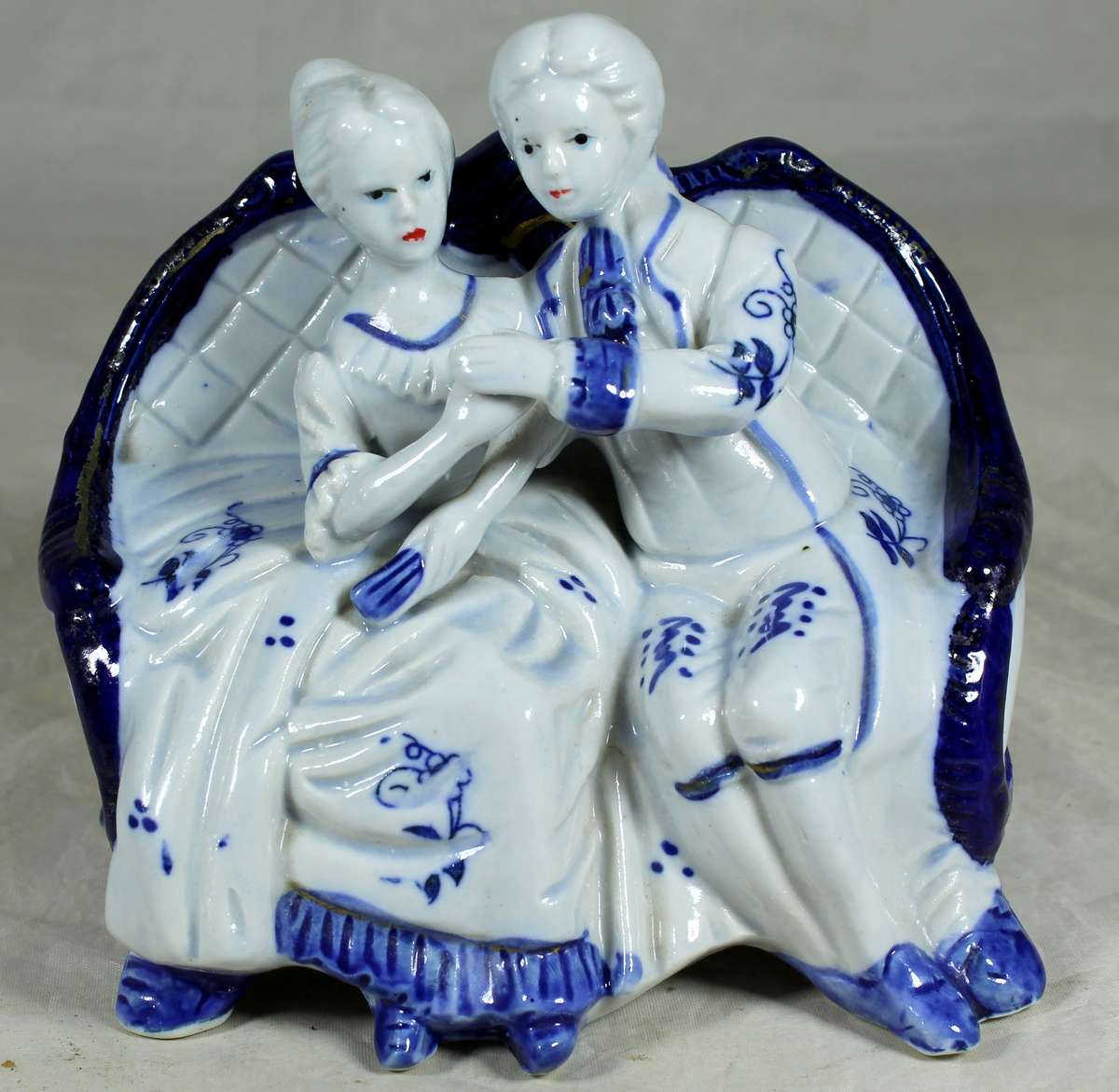 Victorian couple in blue and white