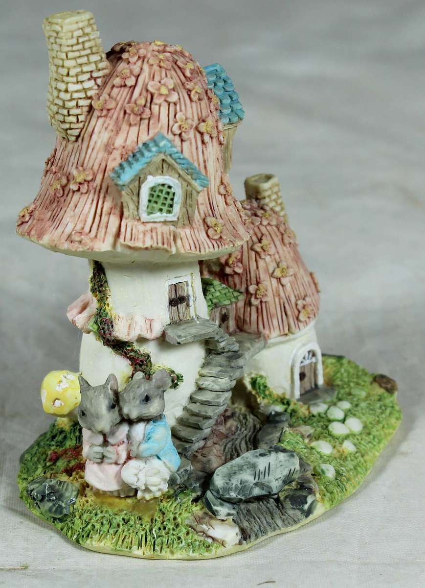 Molded mushroom house with mice