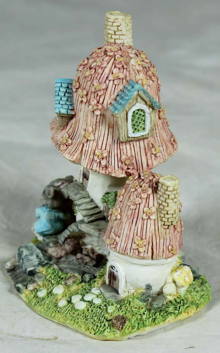 Molded mushroom house with mice