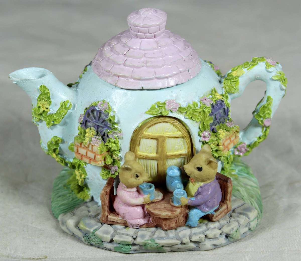Resin small teapot with mice taking tea