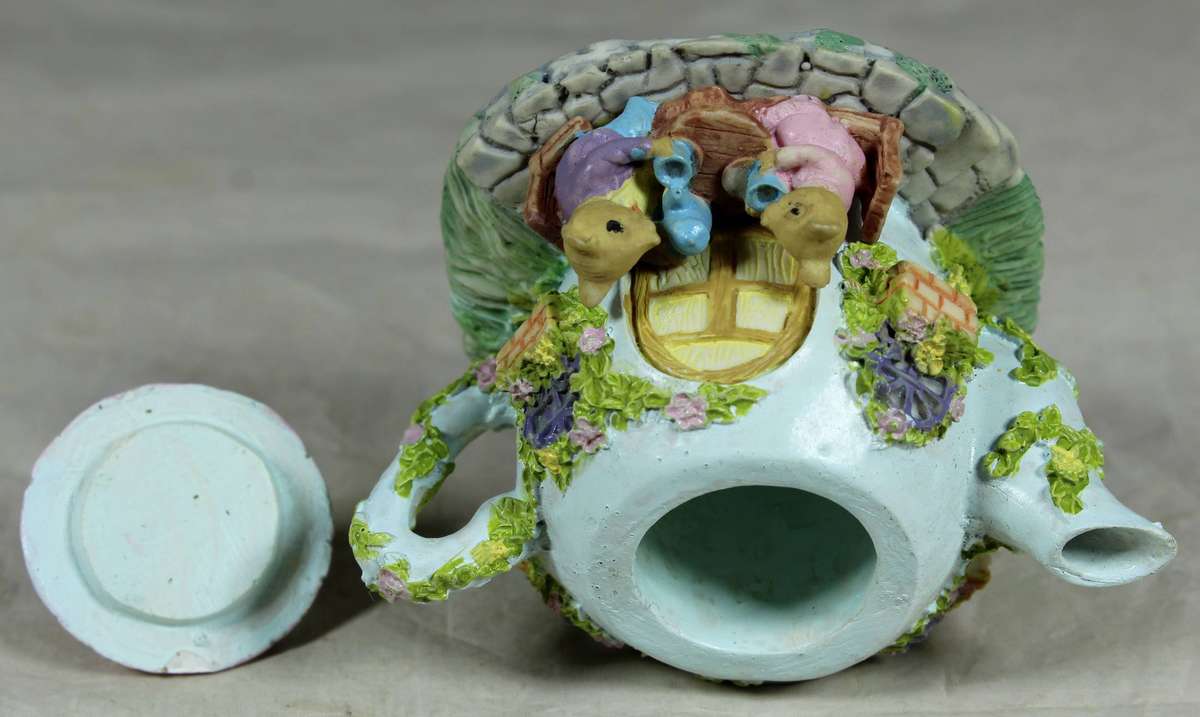 Resin small teapot with mice taking tea