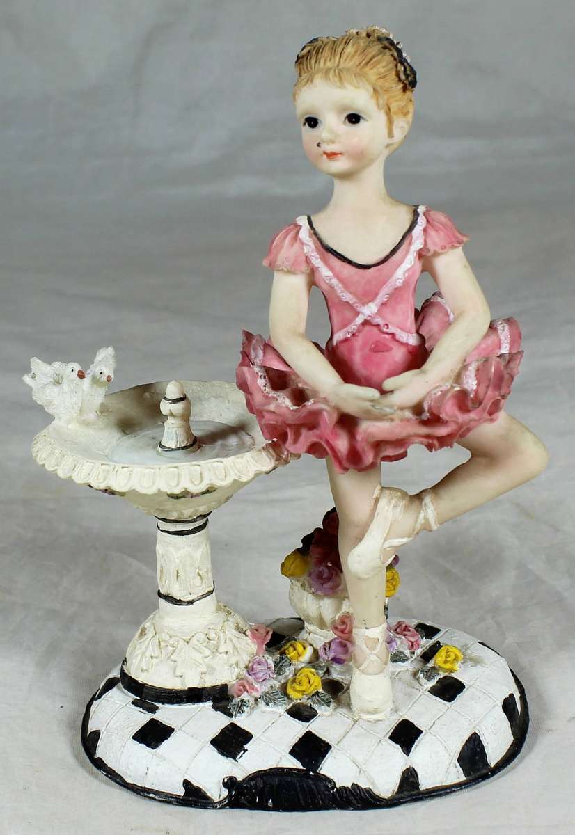 Resin ballerina in pink - Standing next to a bird bath