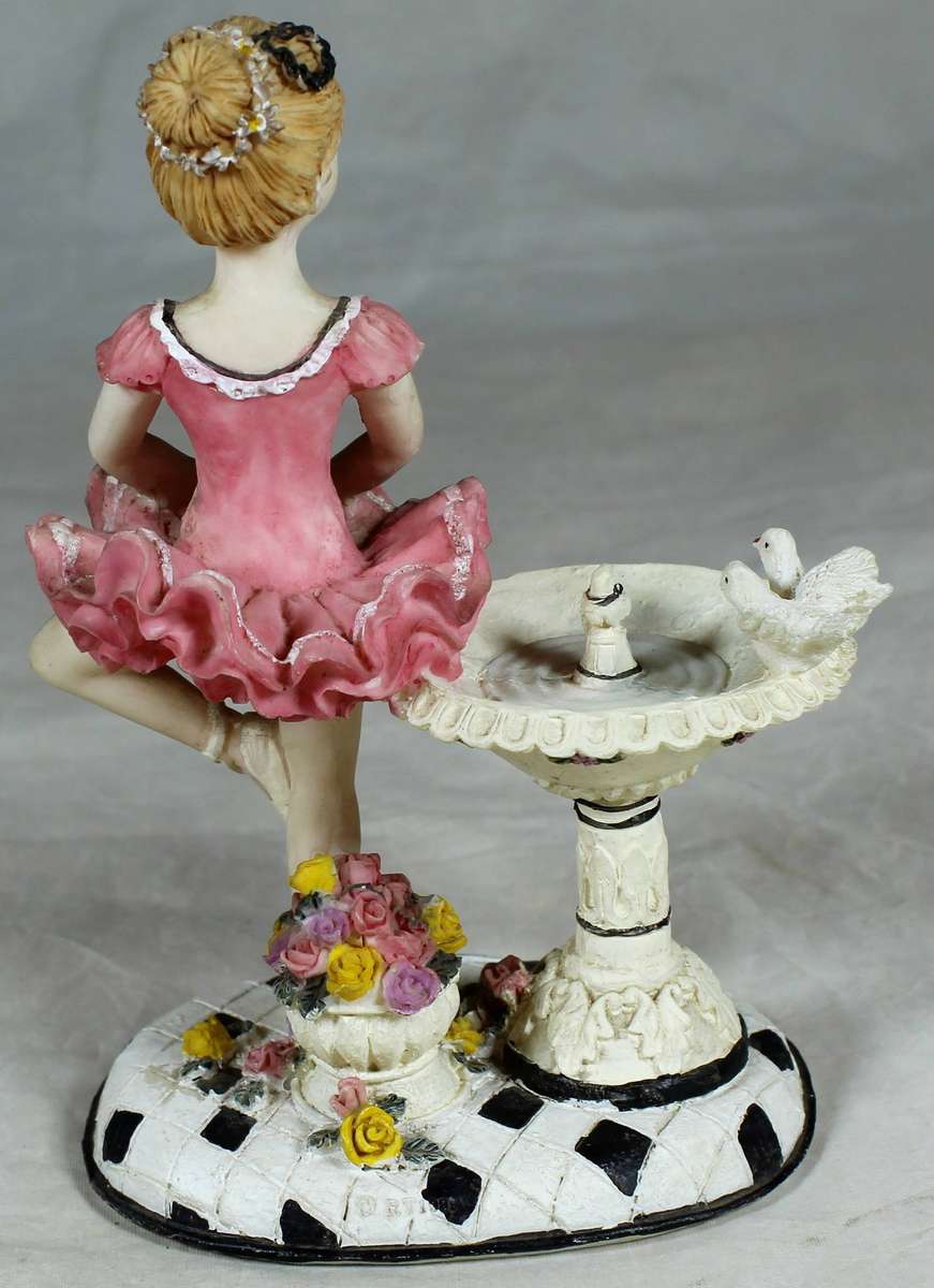 Resin ballerina in pink - Standing next to a bird bath