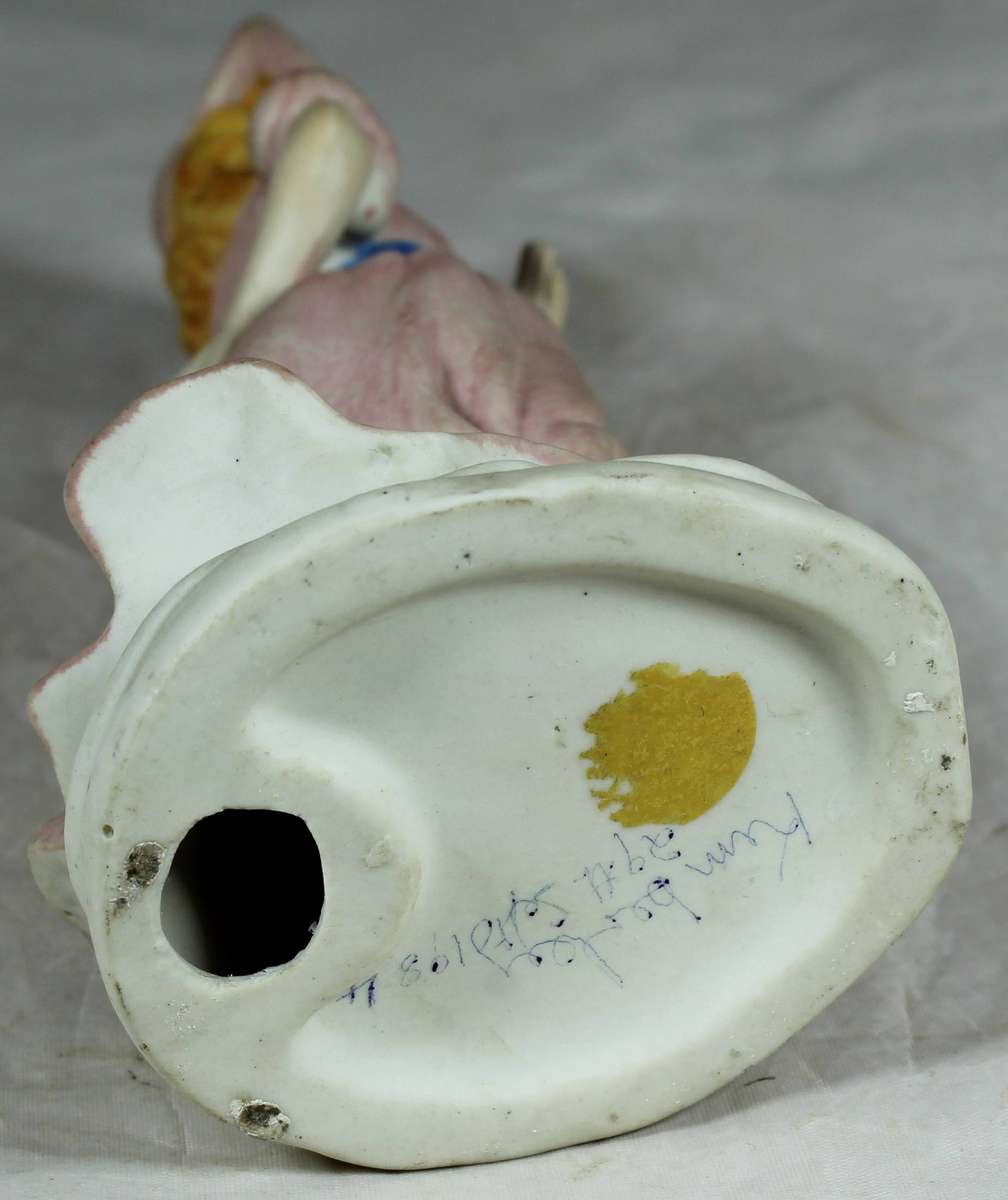 Ceramic vintage lady in a summer dress