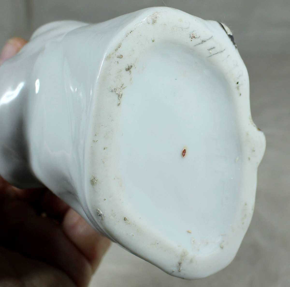 Ceramic girl in traditional dress with parasol