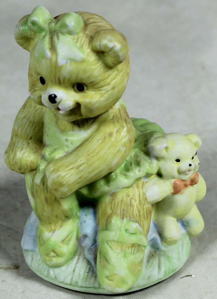 Ceramic figurine - Bear ballerina with green dress, seated
