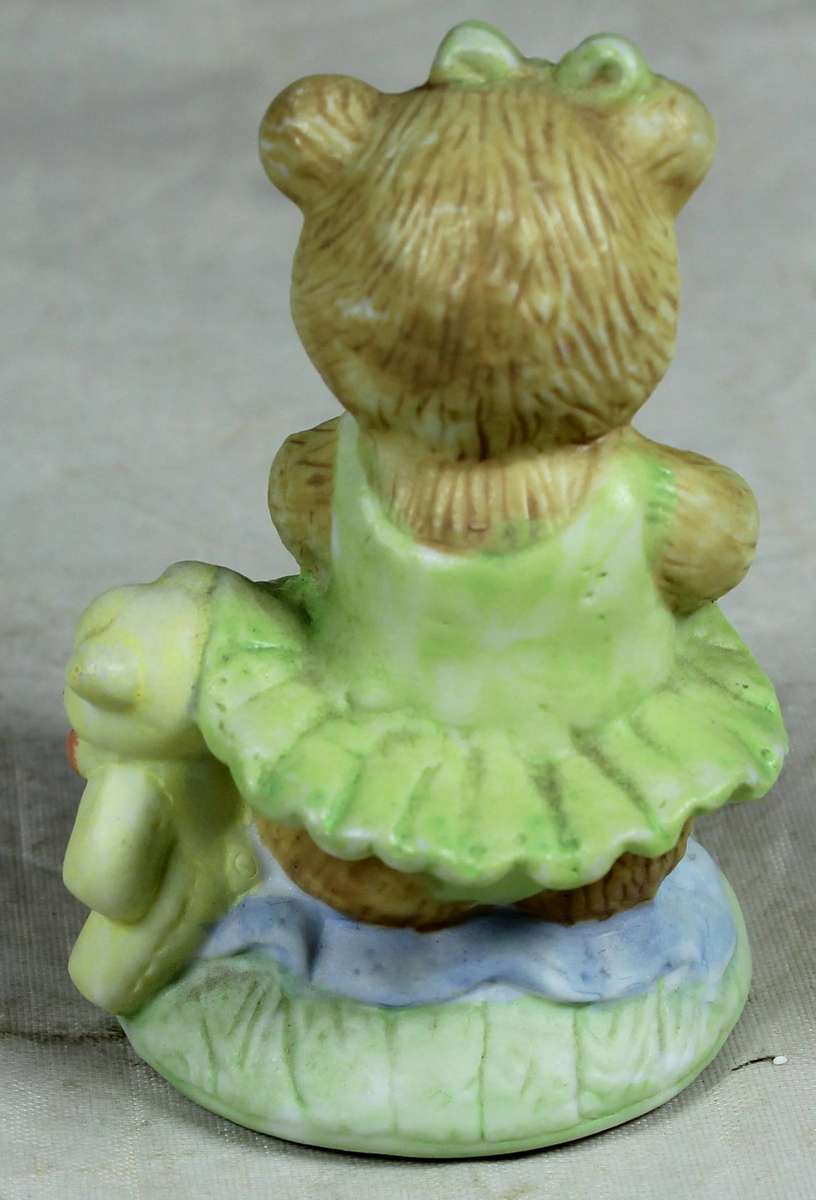 Ceramic figurine - Bear ballerina with green dress, seated
