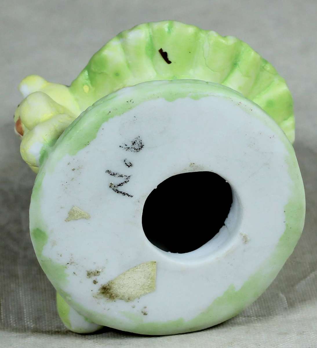 Ceramic figurine - Bear ballerina with green dress, seated