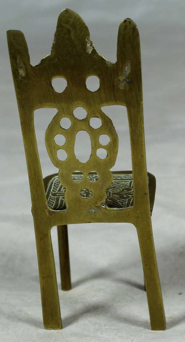 Small brass high-back chair