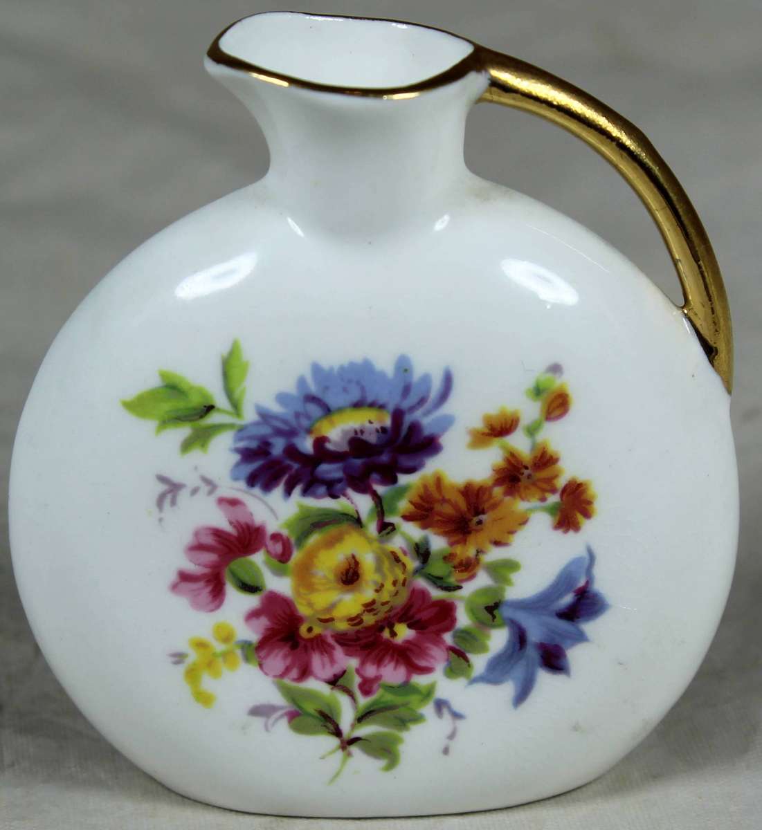 Miniature porcelain Arthur Bowker flat shaped jug