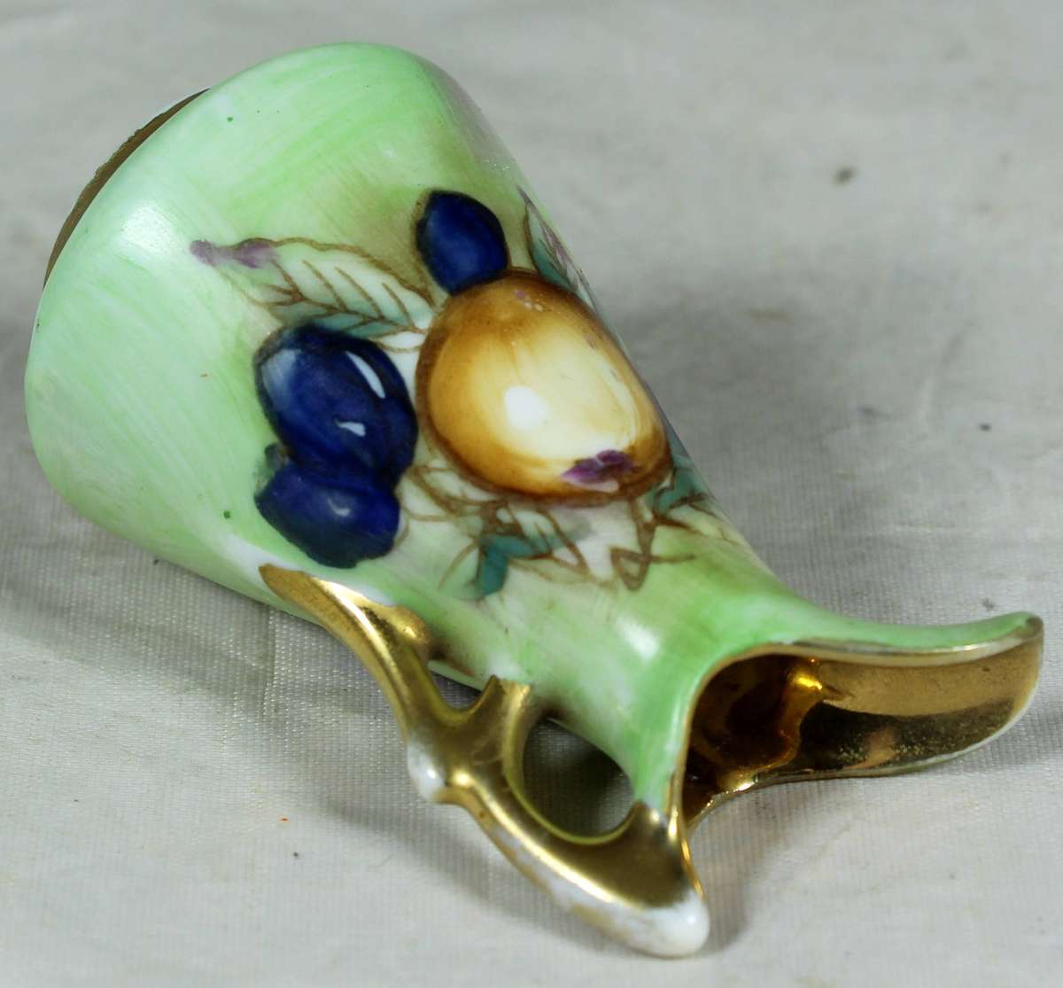 Miniature porcelain painted jug