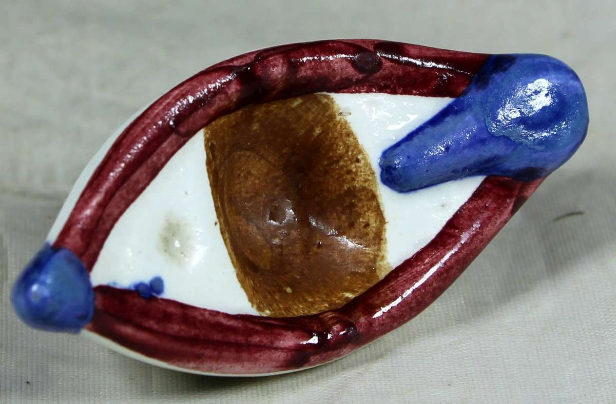 Small ceramic fishers boat