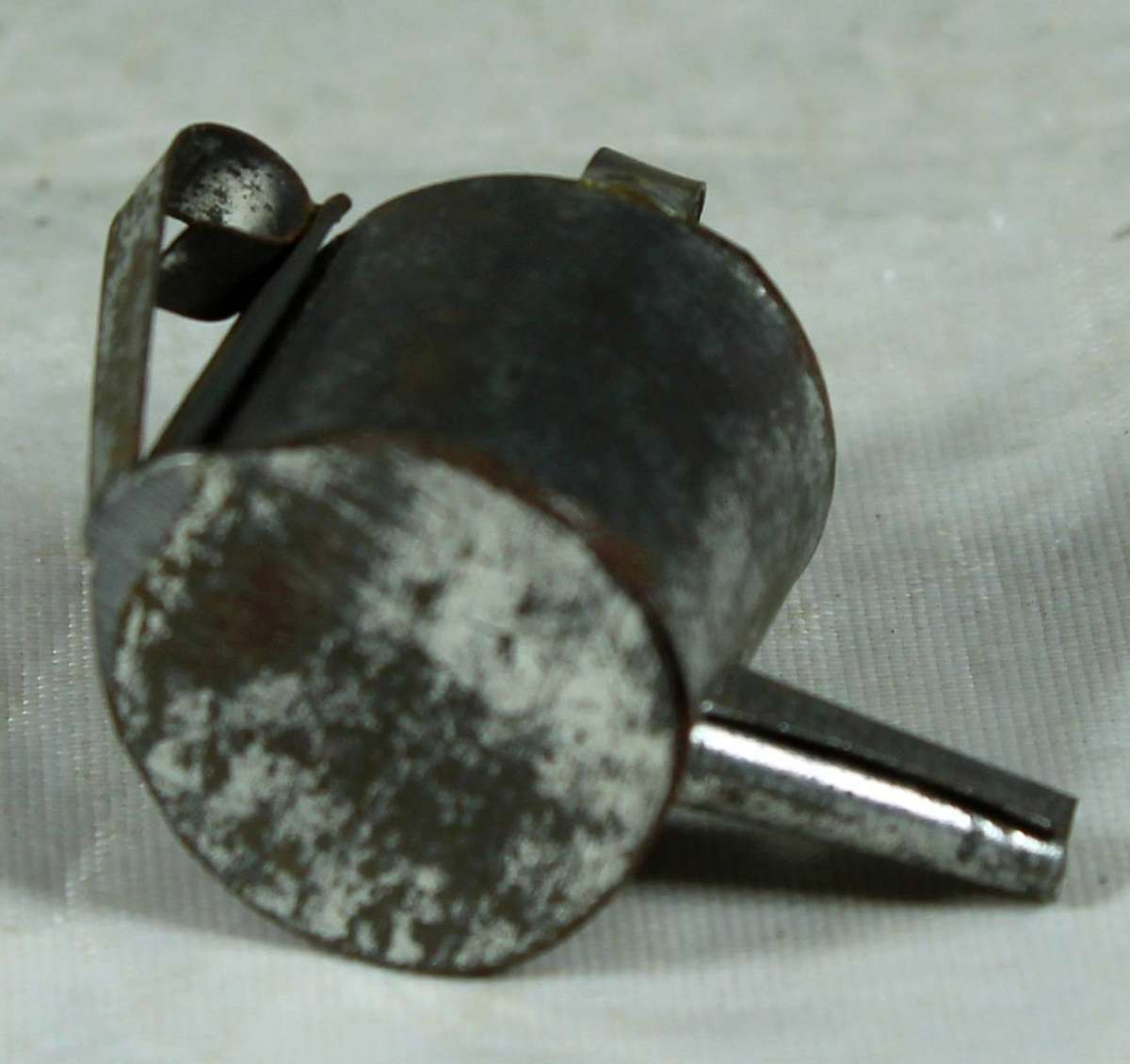 Miniature metal watering can