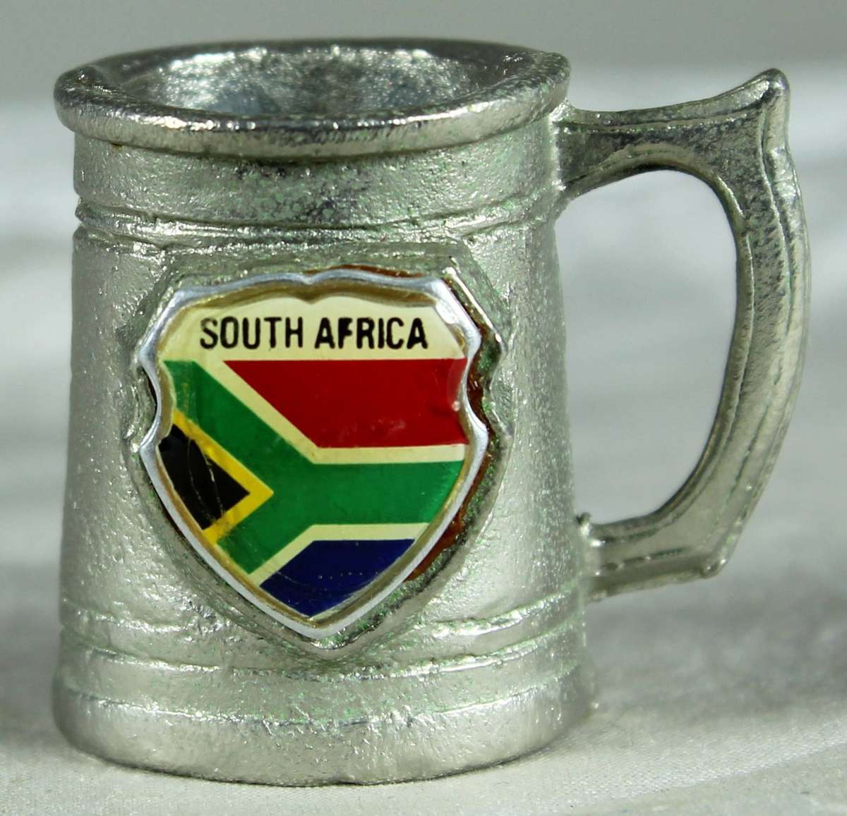 Miniature metal tankard with SA flag