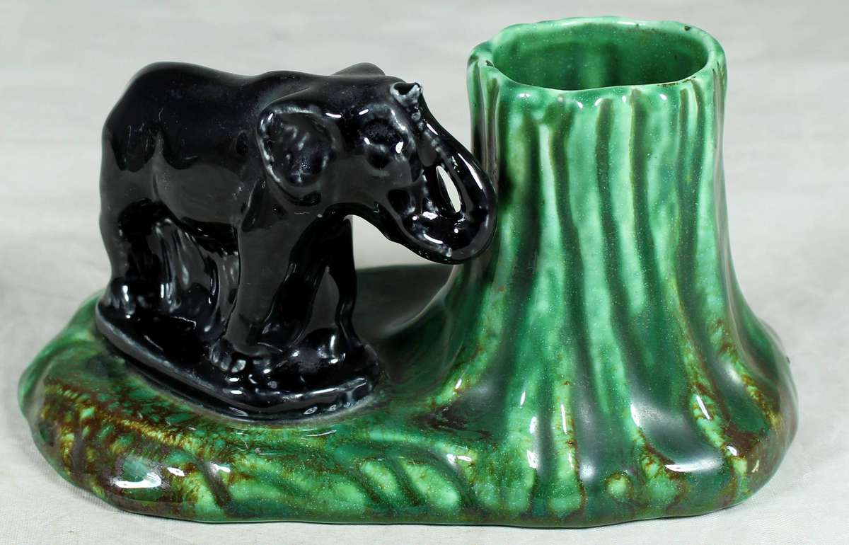 Lucia Ware - Elephant and tree stump pen holder