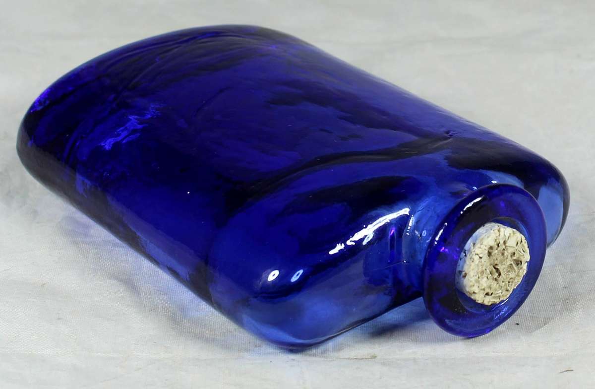 Blue flask type bottle