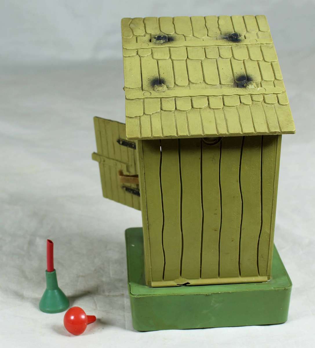 Vintage nowetty man in the outhouse