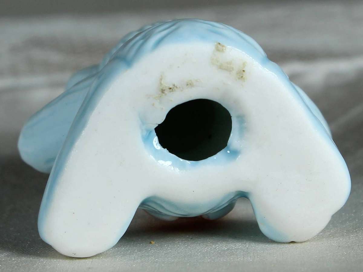 Miniature bear baby blue with bow-tie