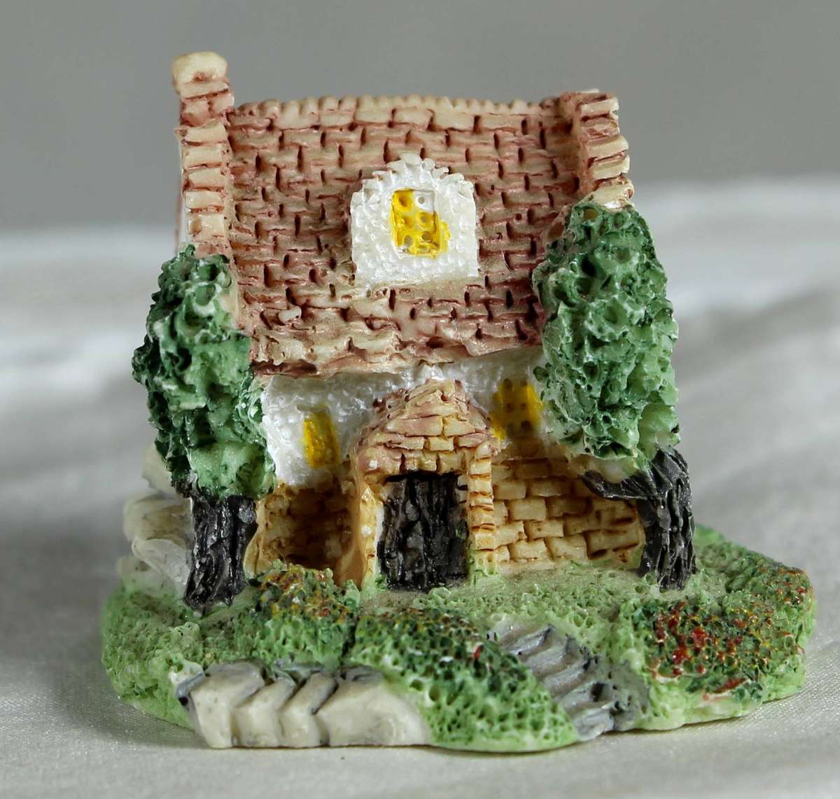 Miniature ceramic cottage with pitched roof