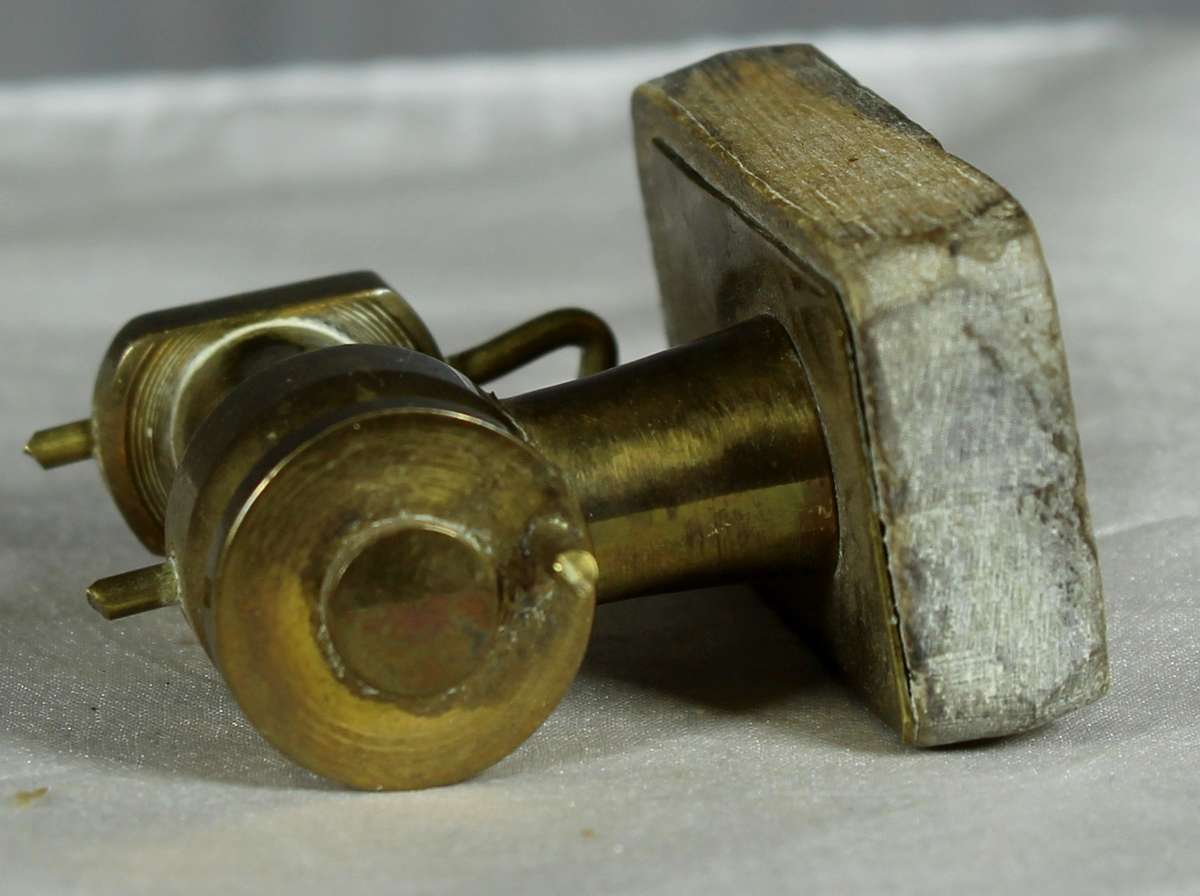 Vintage miniature brass sewing machine