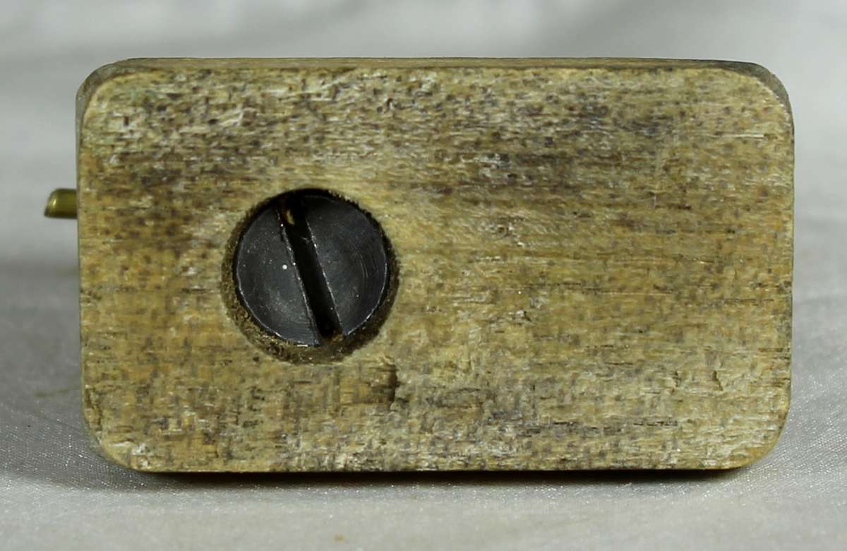 Vintage miniature brass sewing machine