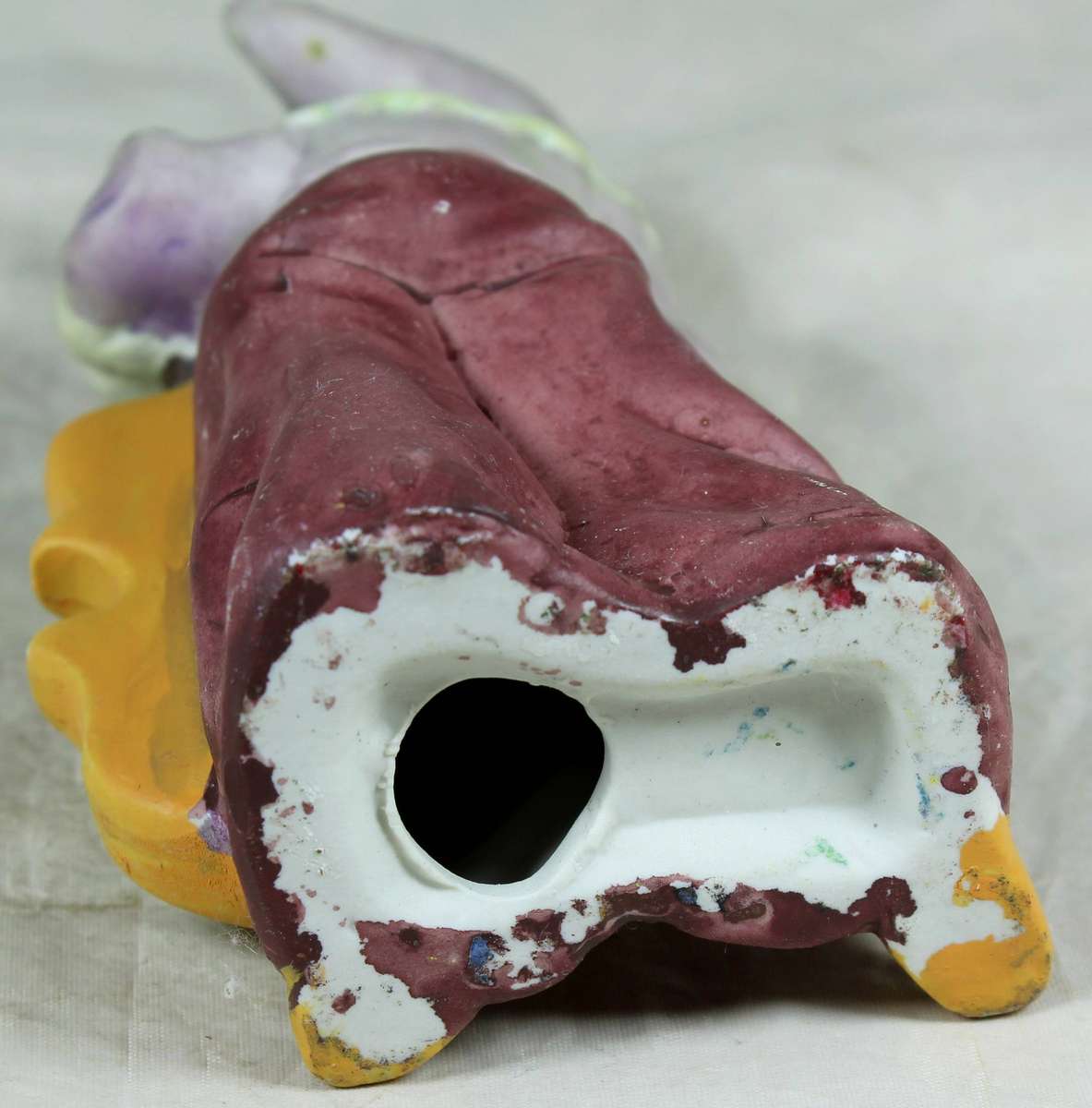 Ceramic figurine - clown playing a cello