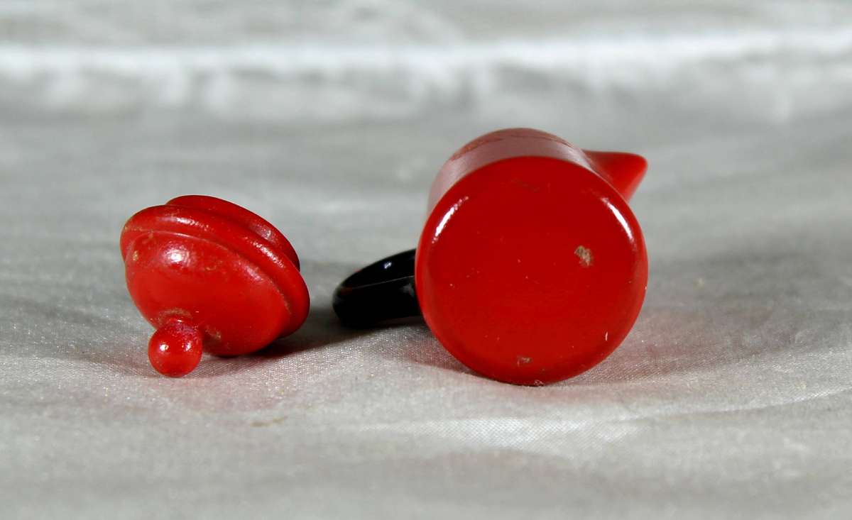 Miniature red painted metal coffee pot