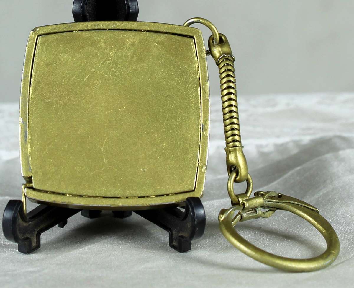 Keyring - brass tape measure