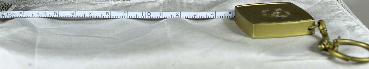 Keyring - brass tape measure