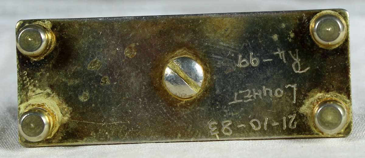 Miniature brass mantel clock