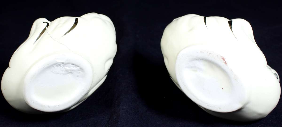 Pair of creme & gold swans