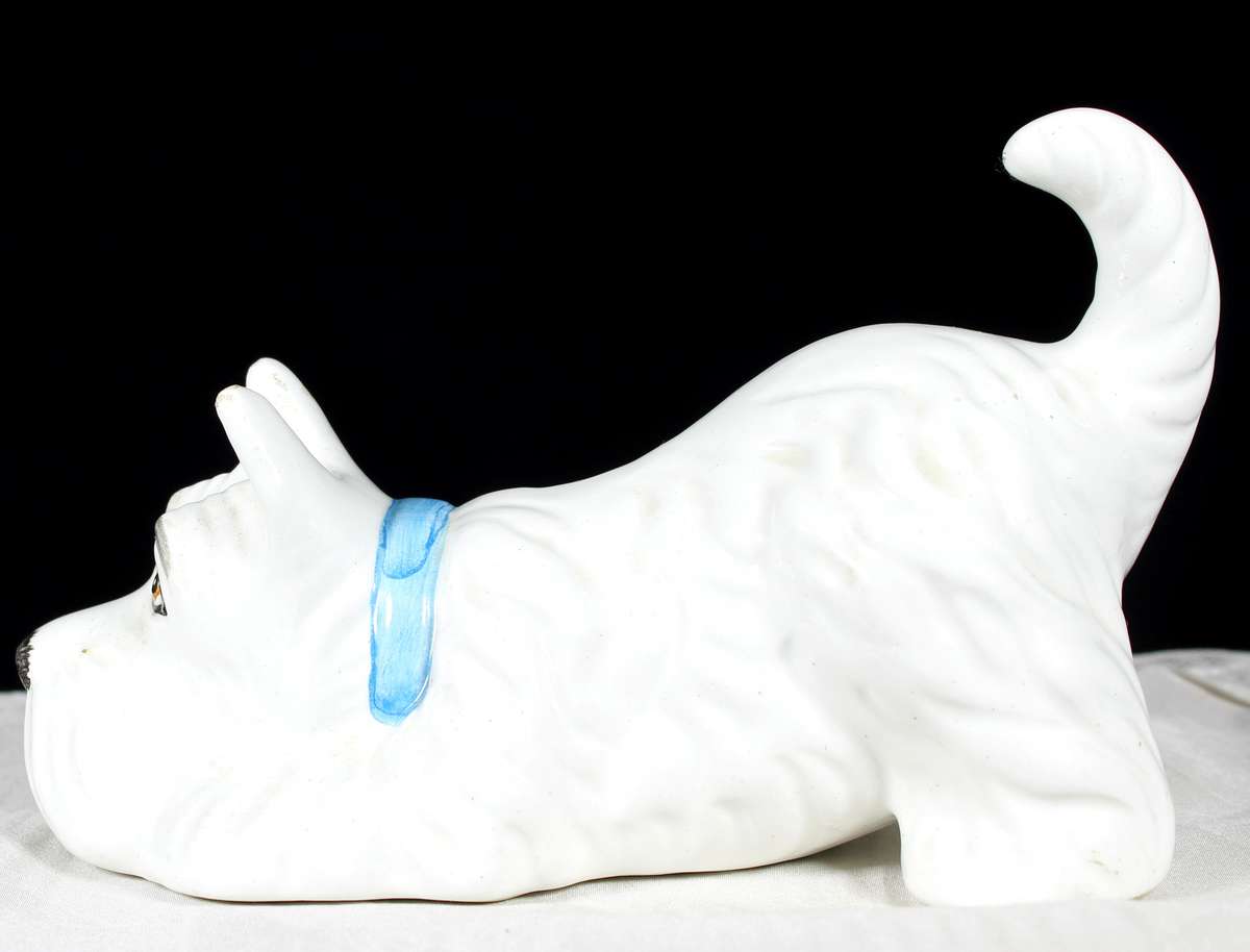 Playful Porcelain Scottish Terrier