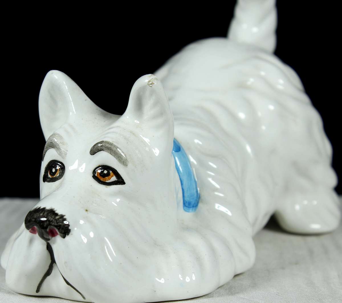 Playful Porcelain Scottish Terrier