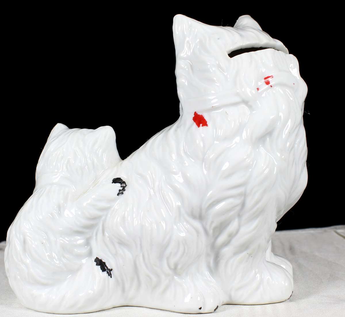 Porcelain cat with kitten money box