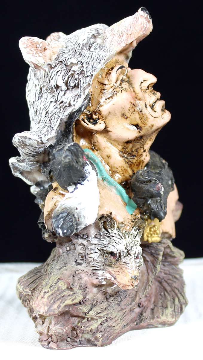 Native American figurine warrior with wolf headgear