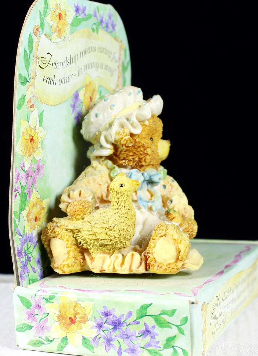 Bear cub with chicken