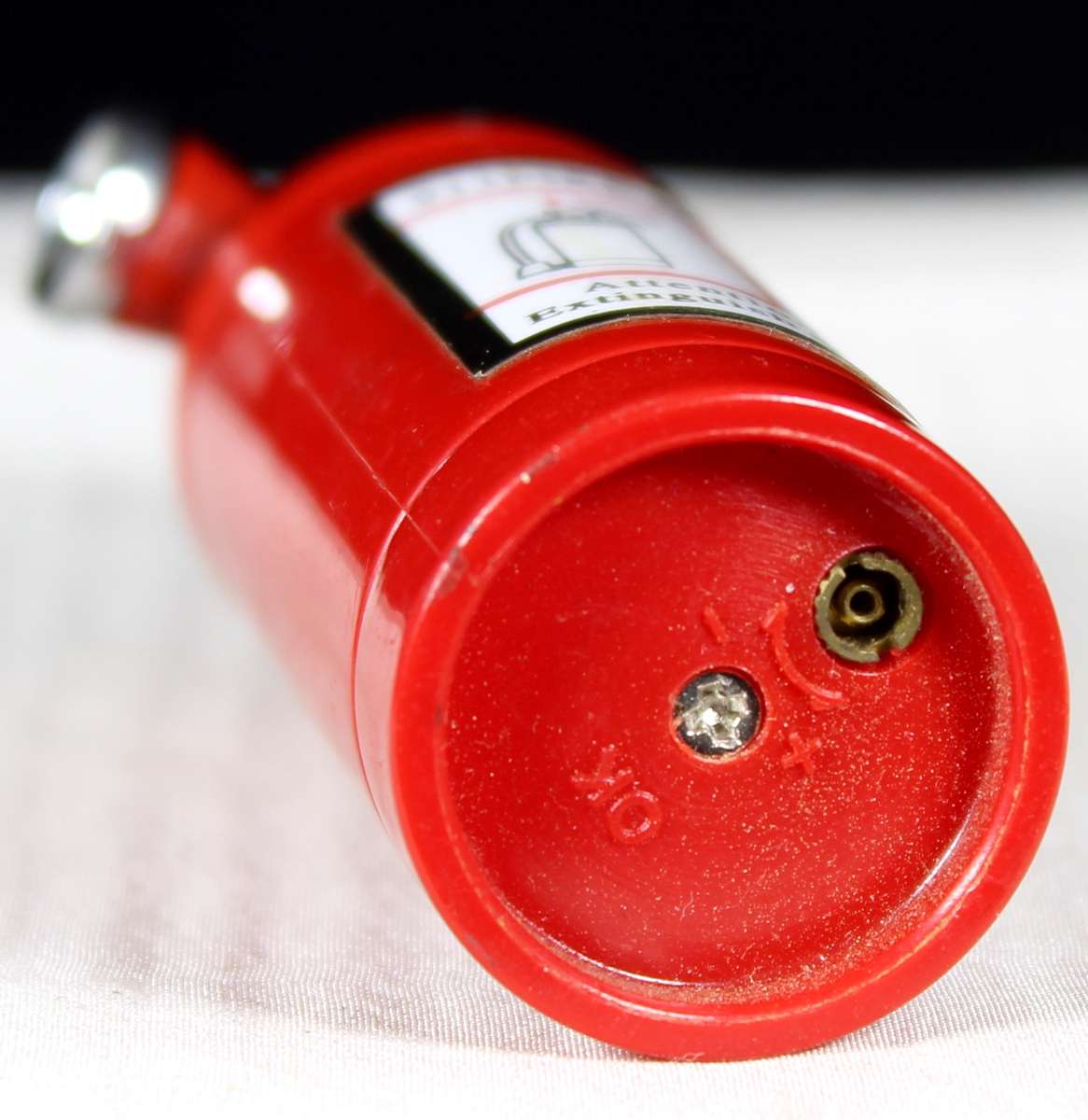 Miniature fire extinguisher lighter